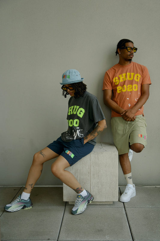 (Paint Splatter Shug Logo Tee